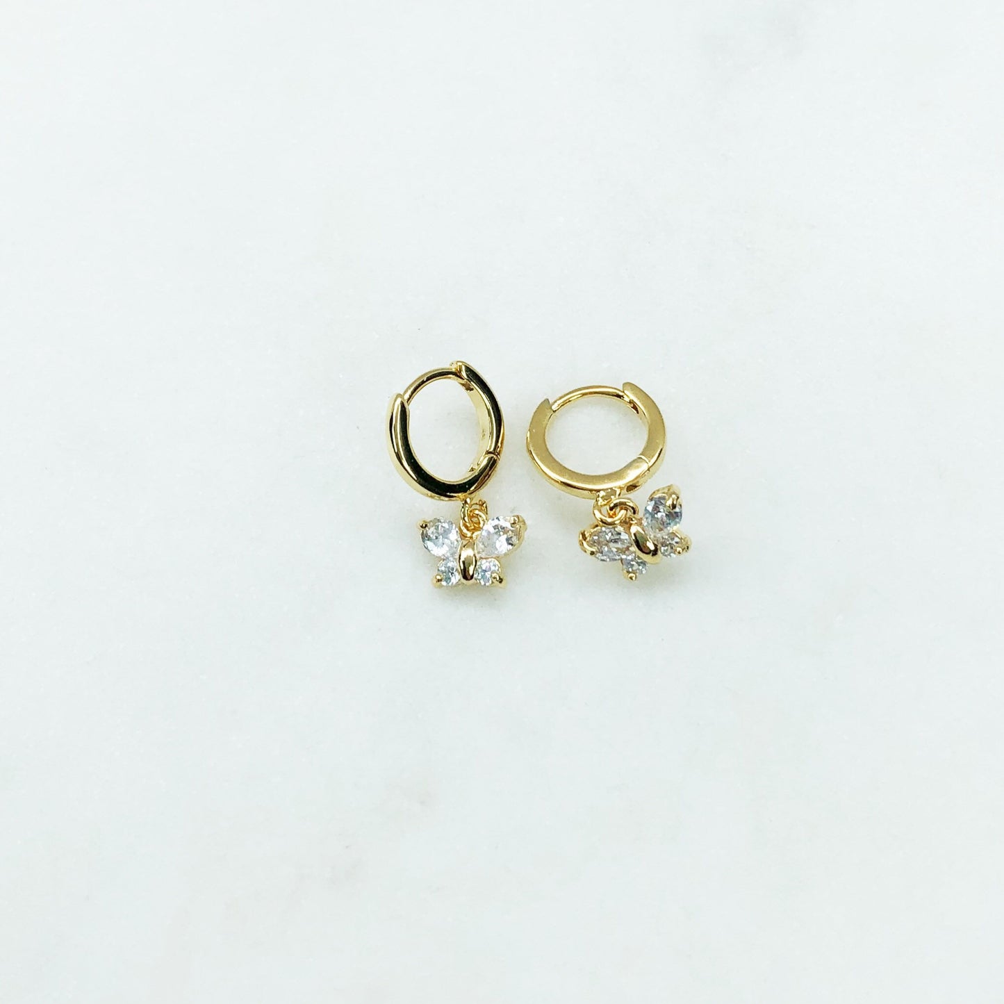 Butterfly huggie charm earrings
