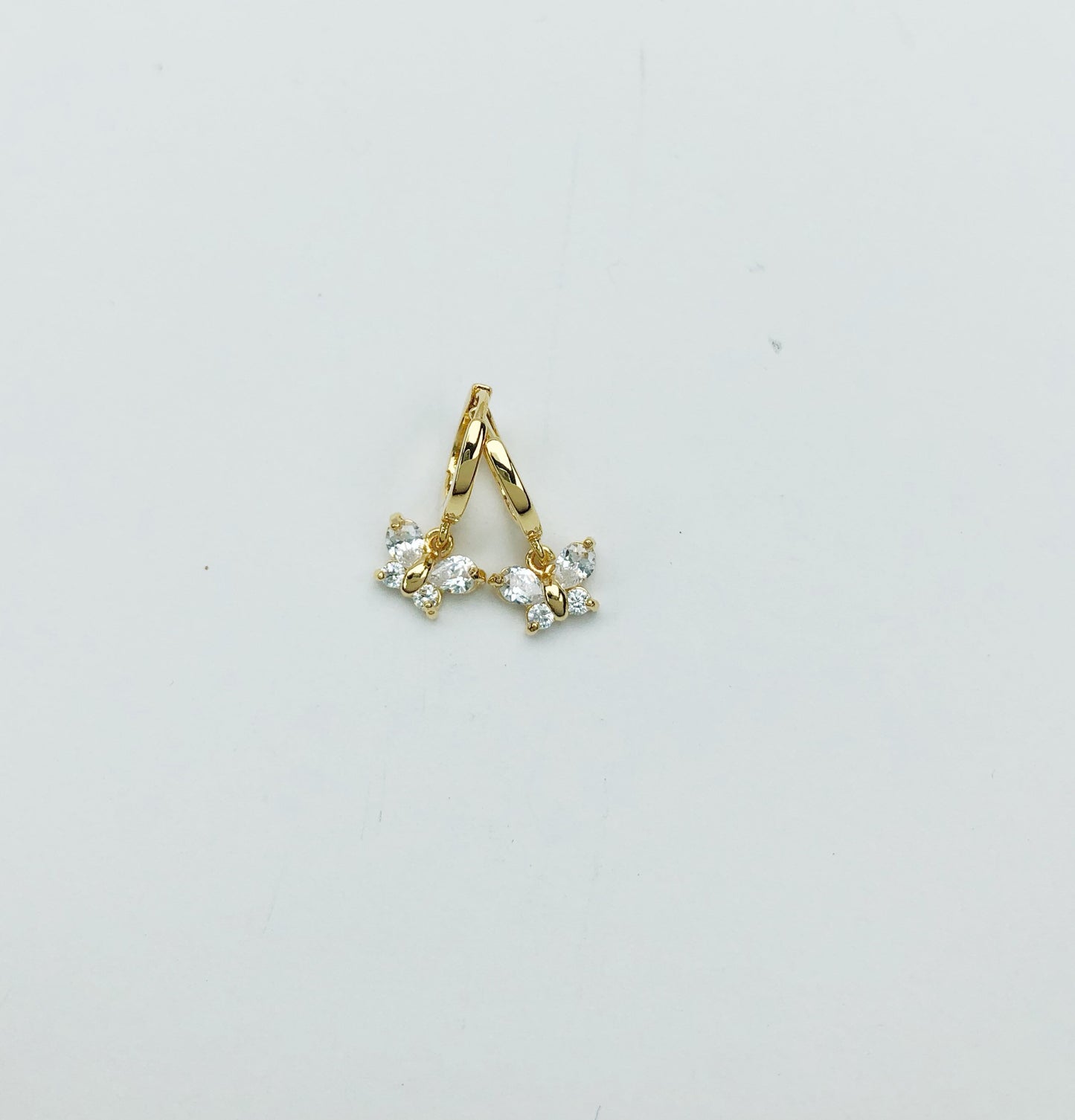 Butterfly huggie charm earrings