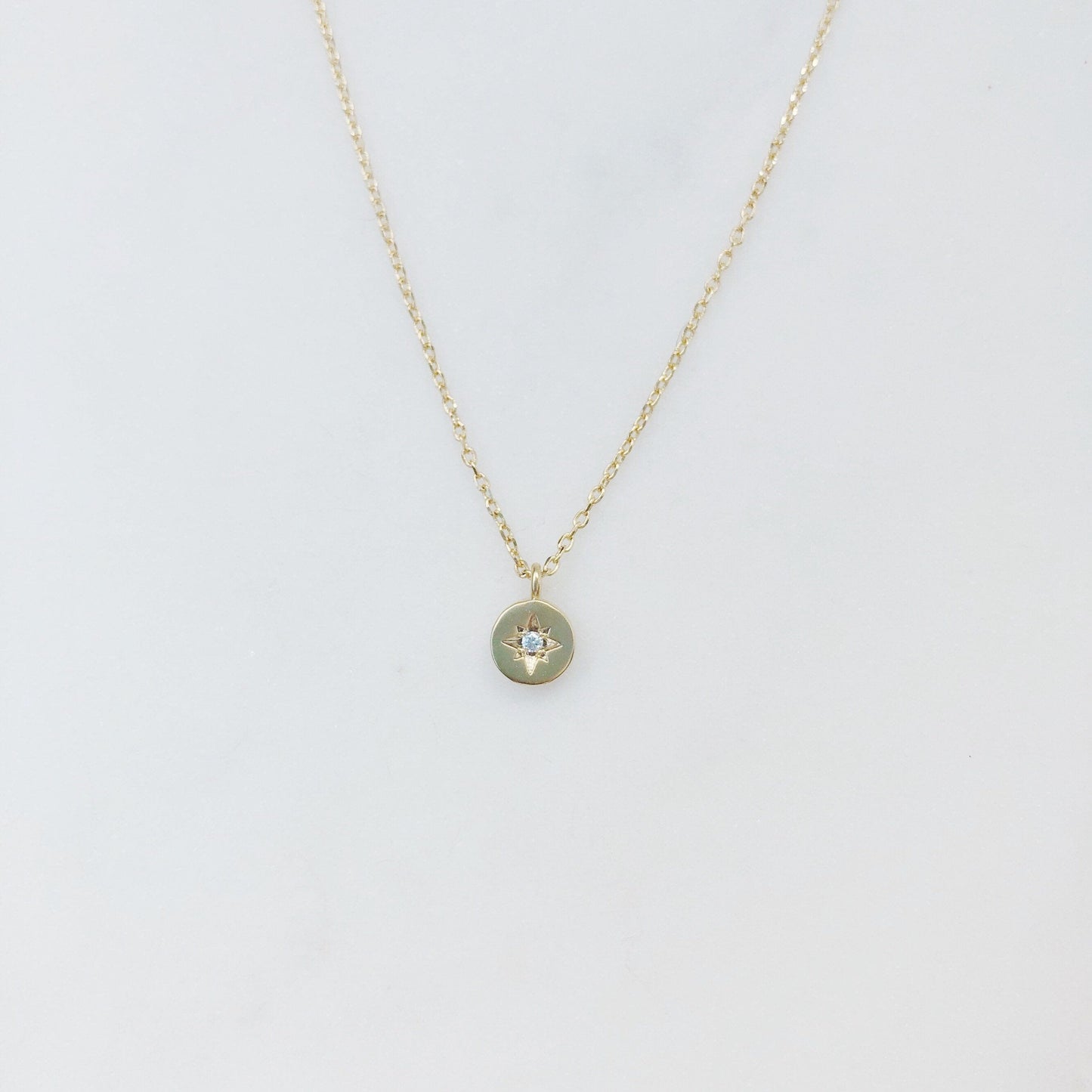 Minimal starburst pendant necklace