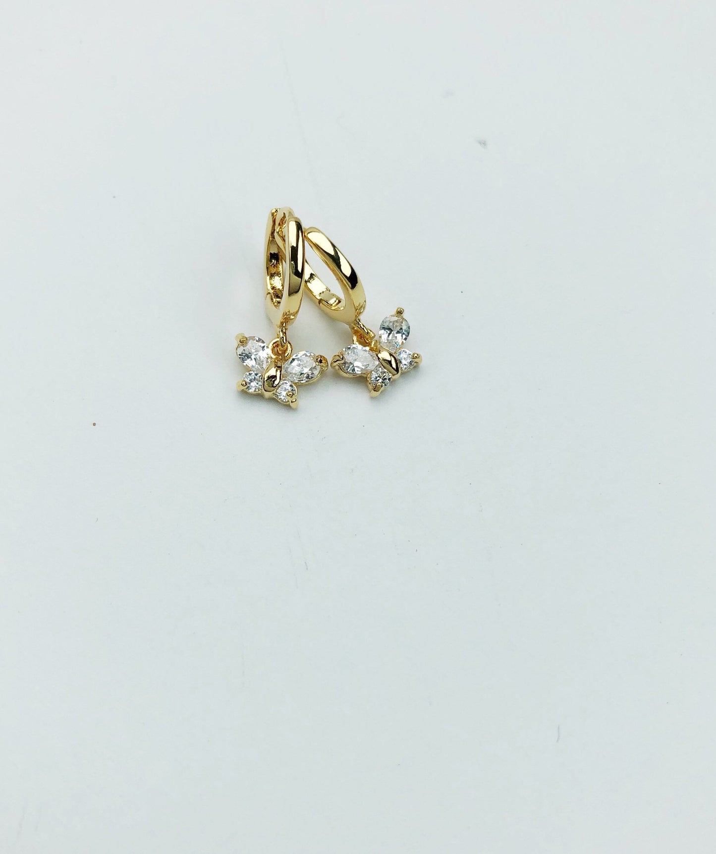 Butterfly huggie charm earrings