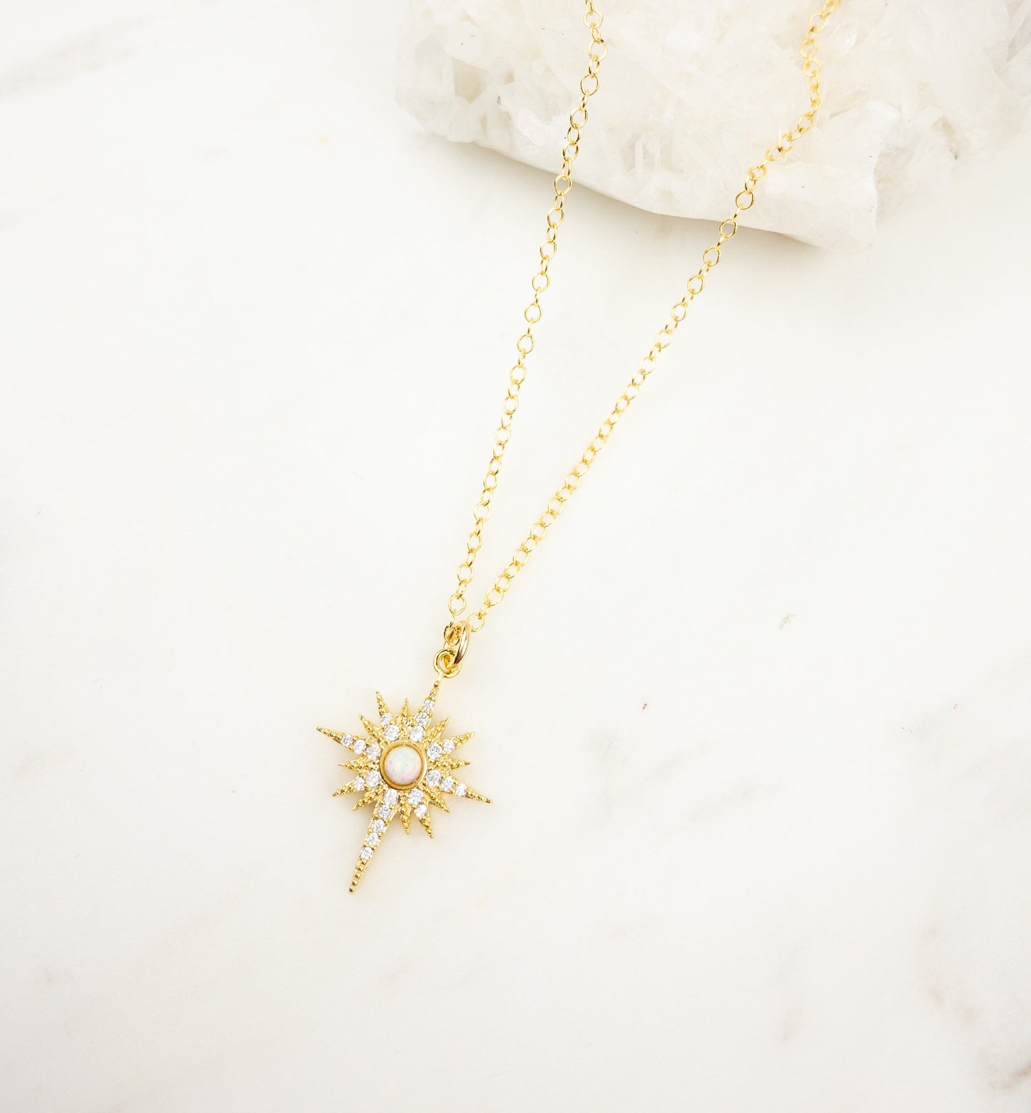 Gold opal star necklace