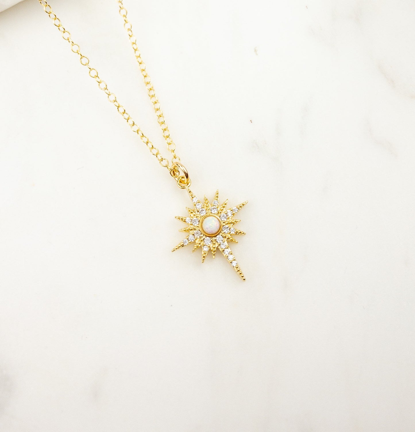 Gold opal star necklace