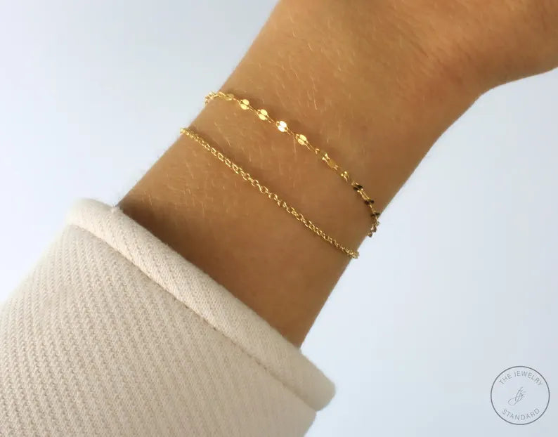 •14K high quality gold plating over Sterling Silver Base Metal
•Includes: 1 lace chain bracelet, 1 cable chain bracelet
•Bracelets will come with a 1.5" extender for adjusting unless otherwise requested