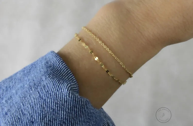 •14K high quality gold plating over Sterling Silver Base Metal
•Includes: 1 lace chain bracelet, 1 cable chain bracelet
•Bracelets will come with a 1.5" extender for adjusting unless otherwise requested