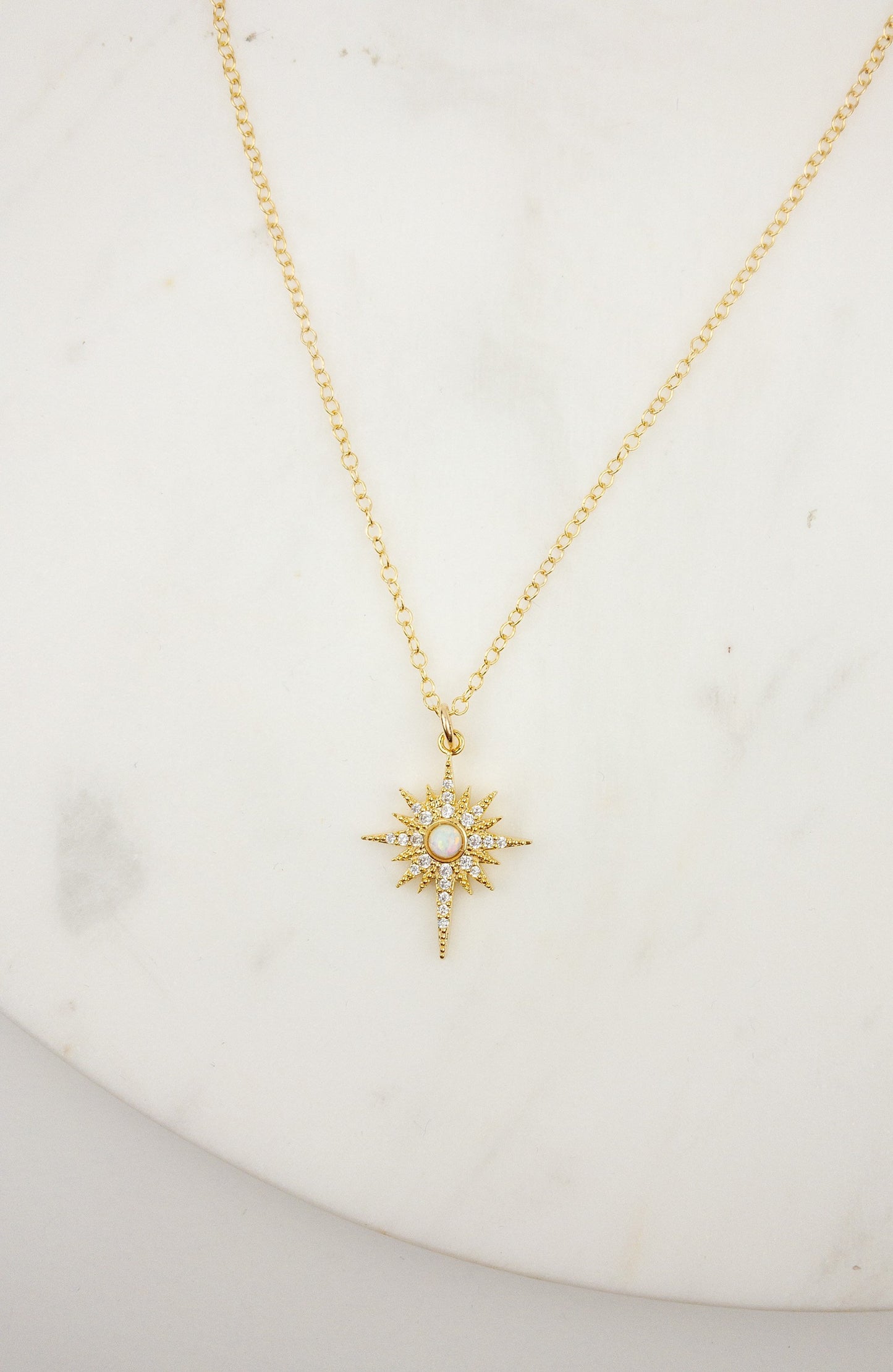 Gold opal star necklace